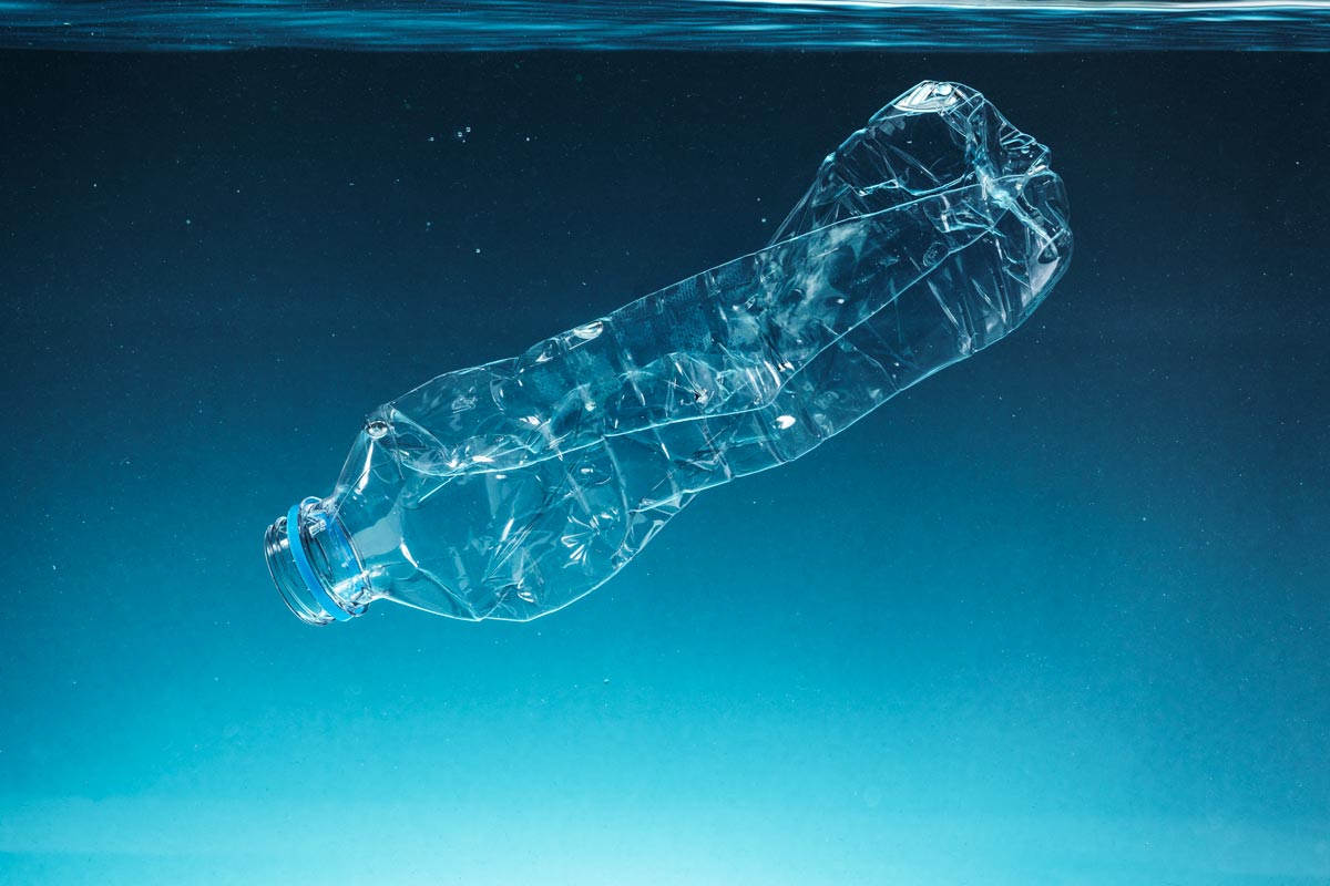 Retulp recycled single use plastic bottle floating in the ocean