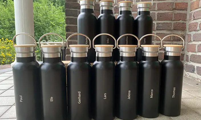 Jubileum Retulp drinkflessen-voornamen bedrukken scholen